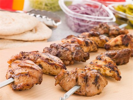 simsearch:400-04105894,k - Marinated Chicken Kebab On A Skewer Foto de stock - Royalty-Free Super Valor e Assinatura, Número: 400-04105959