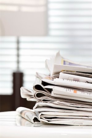 sunday market - pile of newspapers on the table Stock Photo - Budget Royalty-Free & Subscription, Code: 400-04106026
