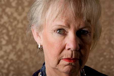 simsearch:400-04744719,k - Closeup portrait of skeptical senior woman with bright lipstick Stock Photo - Budget Royalty-Free & Subscription, Code: 400-04106882