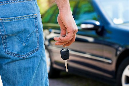 simsearch:400-04107635,k - close up of man holding keys to new car. Copy space Photographie de stock - Aubaine LD & Abonnement, Code: 400-04107640