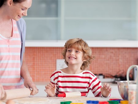 Young Mother with her son Baking in the Kitchen Stock Photo - Budget Royalty-Free & Subscription, Code: 400-04108171