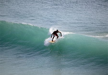simsearch:400-07212763,k - Young men - the surfer in ocean. Bali. Indonesia Photographie de stock - Aubaine LD & Abonnement, Code: 400-04108589