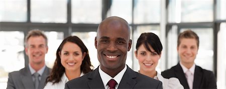 simsearch:400-04745083,k - Young African American Business Man leading a team Foto de stock - Royalty-Free Super Valor e Assinatura, Número: 400-04108720