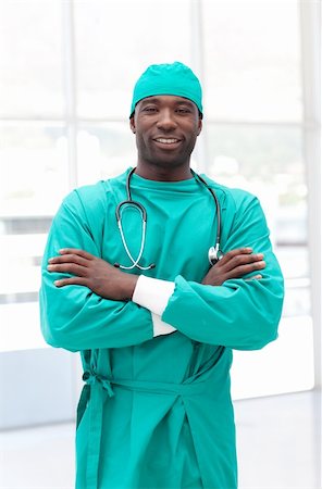 doctors office insurance patient - Male african American Surgeon with arms Folded Stock Photo - Budget Royalty-Free & Subscription, Code: 400-04108791