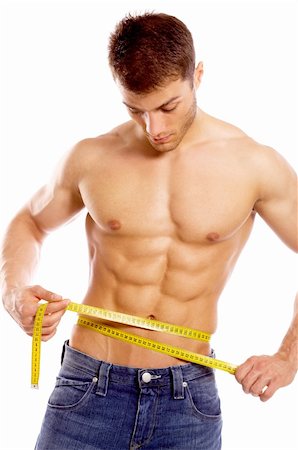 simsearch:400-05906819,k - Muscular and tanned man is being measured Stock Photo - Budget Royalty-Free & Subscription, Code: 400-04108928