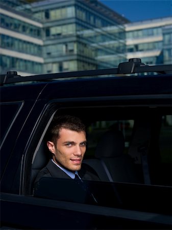 Portrait of business man outside the building Stock Photo - Budget Royalty-Free & Subscription, Code: 400-04109056