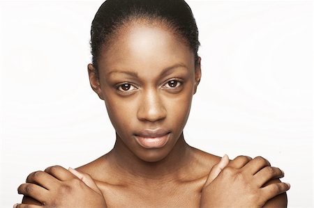 pedi - African woman with natural make-up headshoot Photographie de stock - Aubaine LD & Abonnement, Code: 400-04109307