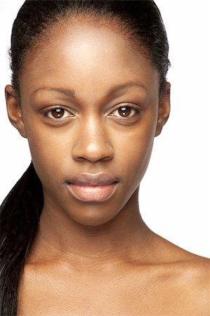 pedi - African woman with natural make-up headshoot Photographie de stock - Aubaine LD & Abonnement, Code: 400-04109309