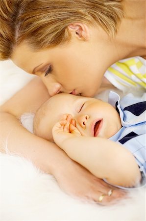 simsearch:400-04535025,k - Young attractive mother with cute little baby Stock Photo - Budget Royalty-Free & Subscription, Code: 400-04109867