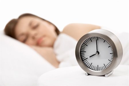 simsearch:400-04316737,k - Alarm clock against the sleeping woman, horizontally Stock Photo - Budget Royalty-Free & Subscription, Code: 400-04109899