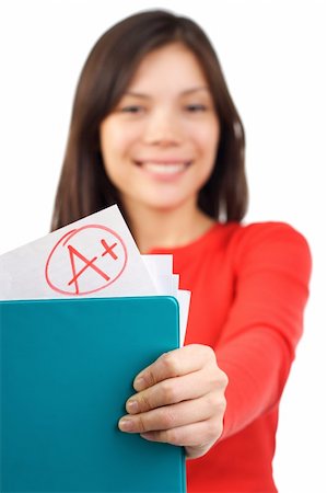 Happy female student showing her top grade. Isolated on white. Stock Photo - Budget Royalty-Free & Subscription, Code: 400-04100352
