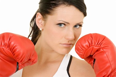 Beautiful Caucasian woman working out with boxing gloves Stock Photo - Budget Royalty-Free & Subscription, Code: 400-04100909