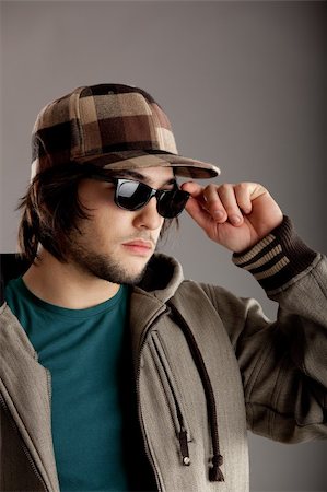 simsearch:400-06769983,k - Good looking young man wearing a sunglasses Foto de stock - Royalty-Free Super Valor e Assinatura, Número: 400-04101320