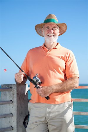 portrait fisherman older - Happy senior man enjoys a day of fishing. Stock Photo - Budget Royalty-Free & Subscription, Code: 400-04102764