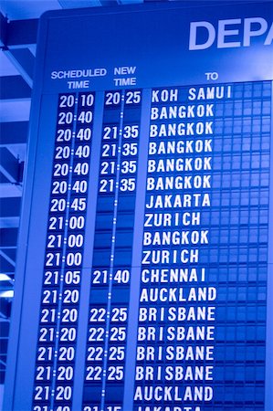 Depature schedule board in asian airport Stock Photo - Budget Royalty-Free & Subscription, Code: 400-04103264