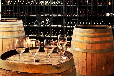 simsearch:400-05248276,k - Row of wine glasses on barrel in winery cellar Stock Photo - Budget Royalty-Free & Subscription, Code: 400-04103512