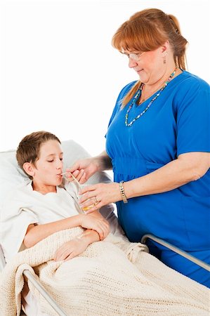 patient on bed and iv - Nurse gets a young patient to drink a glass of orange juice.  Isolated on white. Stock Photo - Budget Royalty-Free & Subscription, Code: 400-04103849