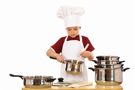 simsearch:400-04114221,k - Serious kid chef checking the food - isolated Stock Photo - Budget Royalty-Free & Subscription, Code: 400-04114219