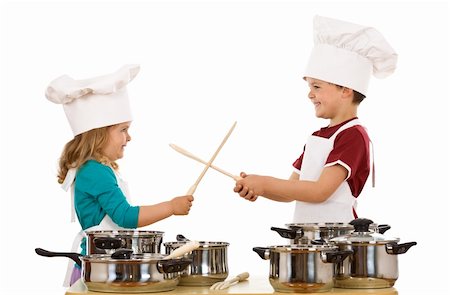 Kid chefs having fun dueling with wooden spoons - isolated Stock Photo - Budget Royalty-Free & Subscription, Code: 400-04114221