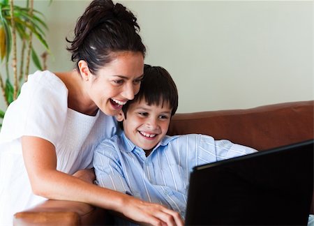 simsearch:400-04712944,k - Happy mother and son having fun with a laptop Stock Photo - Budget Royalty-Free & Subscription, Code: 400-04114602
