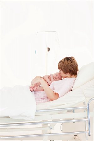 Mother with her newborn baby in a hospital Stock Photo - Budget Royalty-Free & Subscription, Code: 400-04114662
