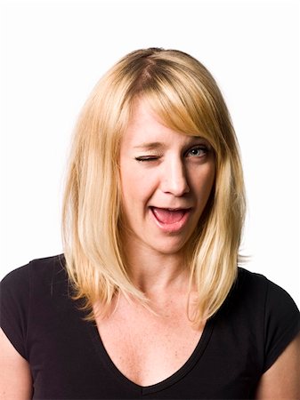 simsearch:400-04807075,k - Blond woman making a funny face Foto de stock - Super Valor sin royalties y Suscripción, Código: 400-04115517