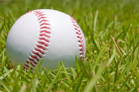 A baseball on a grassy green field. Stock Photo - Budget Royalty-Free & Subscription, Code: 400-04116491