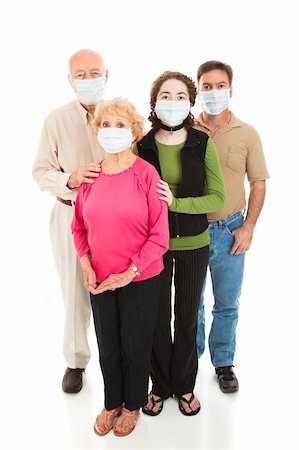 Family worried about a health epidemic.  Full body isolated on white. Stock Photo - Budget Royalty-Free & Subscription, Code: 400-04116788