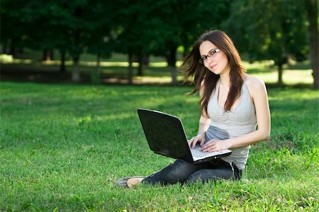 simsearch:6109-06003526,k - student with notebook in the park Stock Photo - Budget Royalty-Free & Subscription, Code: 400-04116879