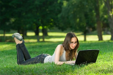 simsearch:6109-06003526,k - student with notebook in the park Stock Photo - Budget Royalty-Free & Subscription, Code: 400-04116884