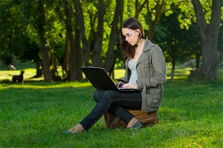 simsearch:6109-06003526,k - student with notebook in the park Stock Photo - Budget Royalty-Free & Subscription, Code: 400-04116886