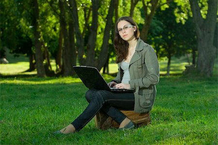 simsearch:6109-06003526,k - student with notebook in the park Stock Photo - Budget Royalty-Free & Subscription, Code: 400-04116887