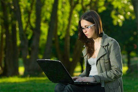 simsearch:6109-06003526,k - student with notebook in the park Stock Photo - Budget Royalty-Free & Subscription, Code: 400-04116888