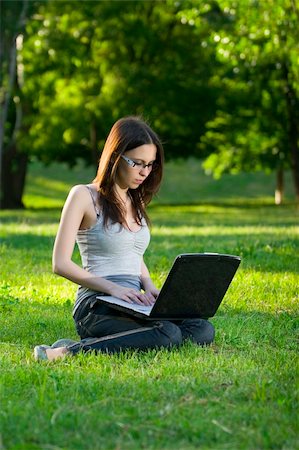 simsearch:6109-06003526,k - student with notebook in the park Stock Photo - Budget Royalty-Free & Subscription, Code: 400-04116881