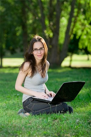 simsearch:6109-06003526,k - student with notebook in the park Stock Photo - Budget Royalty-Free & Subscription, Code: 400-04116882