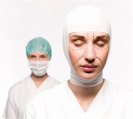 facelift bandage - Woman prepared for plastic surgery with a nurse at her back Stock Photo - Budget Royalty-Free & Subscription, Code: 400-04117251