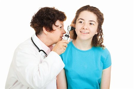 doctors office insurance patient - Female doctor checks inside the ears of her teenage patient.  Isolated on white. Stock Photo - Budget Royalty-Free & Subscription, Code: 400-04117274