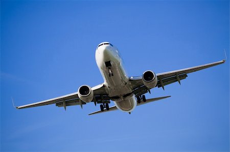 Passenger airplane before landing in an airport Stock Photo - Budget Royalty-Free & Subscription, Code: 400-04117958