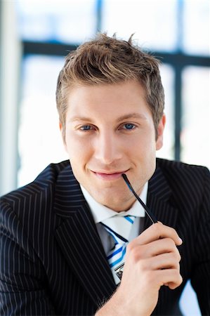simsearch:400-07680948,k - Attractive businessman looking to the camera wearing glasses Stock Photo - Budget Royalty-Free & Subscription, Code: 400-04118203