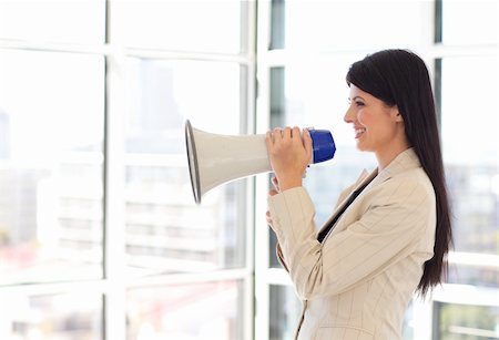 simsearch:400-09223567,k - Attractive businesswoman shouting through megaphone Stock Photo - Budget Royalty-Free & Subscription, Code: 400-04118227