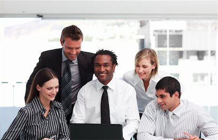 Multi-ethnic business team working in an office Stock Photo - Budget Royalty-Free & Subscription, Code: 400-04118279