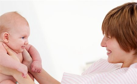 pictures of new born baby rooms - Woman playing with her newborn baby in hospital Foto de stock - Super Valor sin royalties y Suscripción, Código: 400-04118448