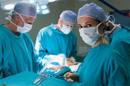 Four Surgeons Getting Ready To Operating On A Patient Stock Photo - Budget Royalty-Free & Subscription, Code: 400-04119001