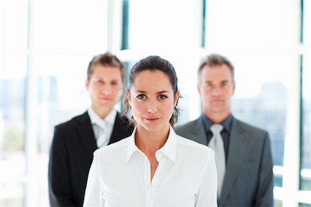 Young brunette businesswoman leading her team Photographie de stock - Aubaine LD & Abonnement, Code: 400-04119260