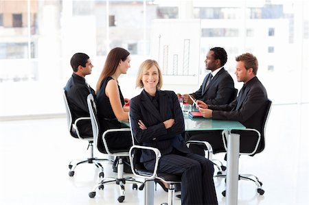 simsearch:400-04918393,k - Cofident mature businesswoman sitting with foded arms in a meeting Stock Photo - Budget Royalty-Free & Subscription, Code: 400-04119636