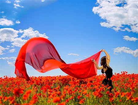 young pretty girl relaxing in the poppy field Stock Photo - Budget Royalty-Free & Subscription, Code: 400-04119735