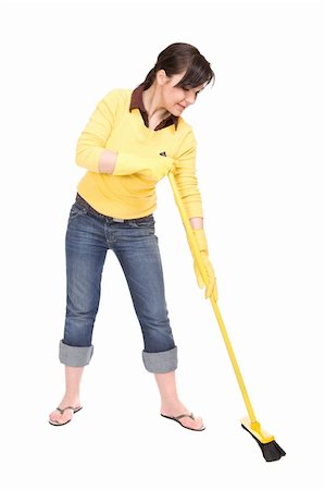 picture of a lady sweeping the floor - attractive brunette woman doing housework, over white background Stock Photo - Budget Royalty-Free & Subscription, Code: 400-04110219