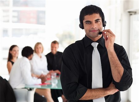 simsearch:400-04129170,k - Young business Team working in a call centre Fotografie stock - Microstock e Abbonamento, Codice: 400-04111034