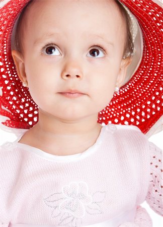 simsearch:400-04318989,k - Portarite of a cute girl in red hat Fotografie stock - Microstock e Abbonamento, Codice: 400-04111125