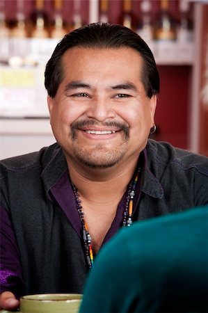 simsearch:400-04732676,k - Handsome Native American man with friend in a restaurant Foto de stock - Royalty-Free Super Valor e Assinatura, Número: 400-04111296